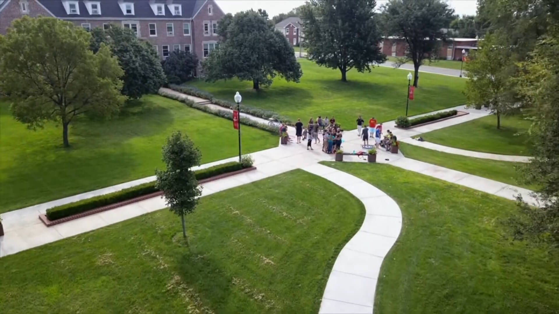 An aerial drone captures a stunning bird's-eye view of the courtyard in front of Barclay College