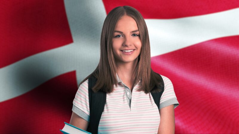 A Student and Danish Flag, Symbolizing Denmark's Education System